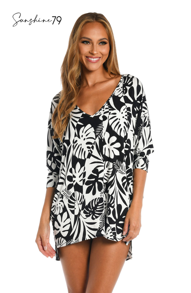 Model is wearing a black and white multi colored tropical printed cover up tunic from our Optic Tropic collection!