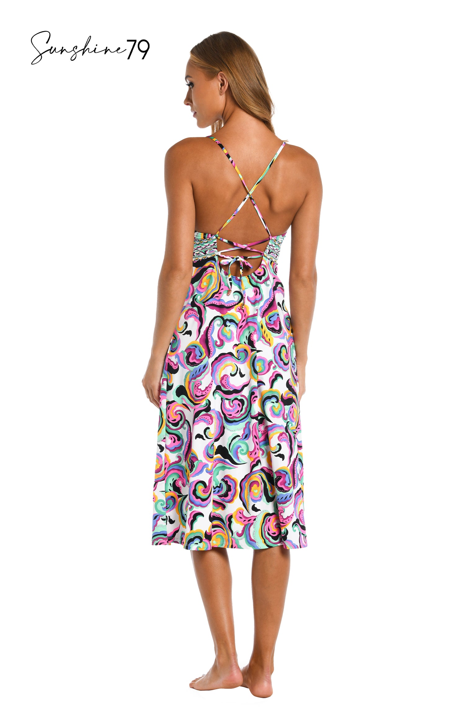 Model is wearing a multicolored swirl printed midi dress cover up from our Sunshine 79 brand.