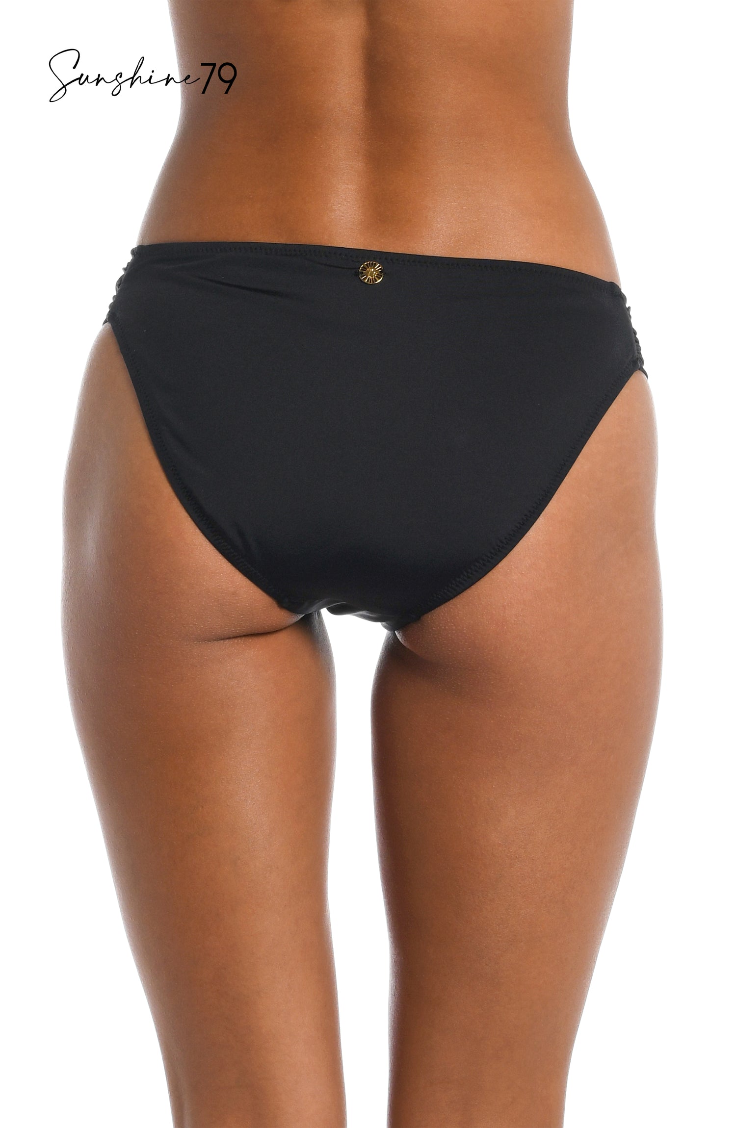 Model is wearing a solid black side shirred hipster bottom from our Sunshine 79 brand.