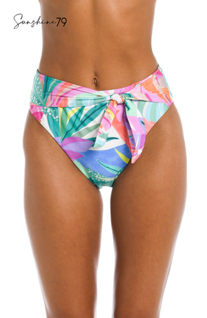 Model is wearing a multi colored tropical printed front tie high waist bottom from our Sunshine 79 brand.