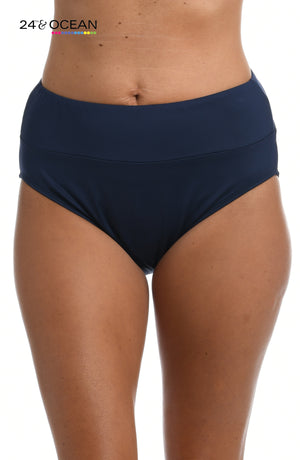 Model is wearing a solid midnight blue colored high waist bikini bottom from our 24th & Ocean brand.