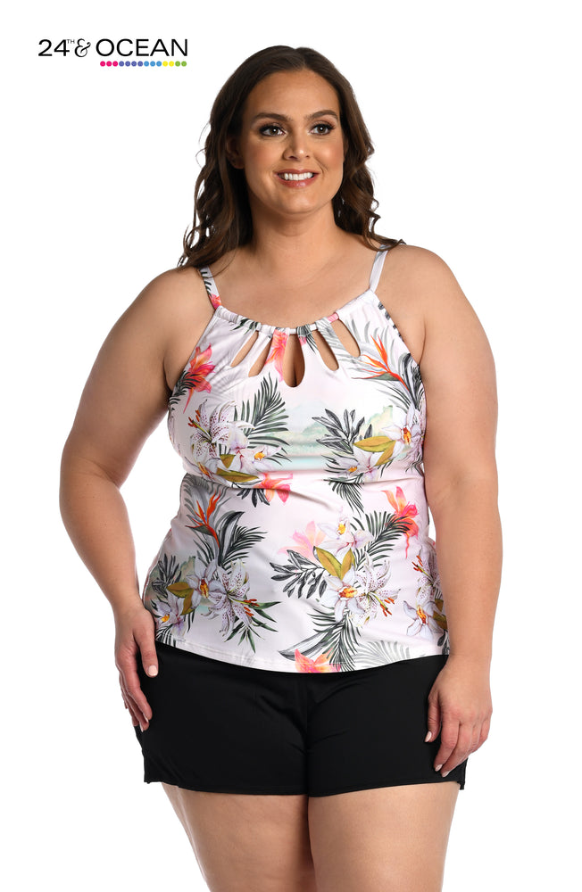 
            
                Load image into Gallery viewer, Model is wearing a white multi colored tropical printed high neck tankini top from our Tahiti Skies collection!
            
        