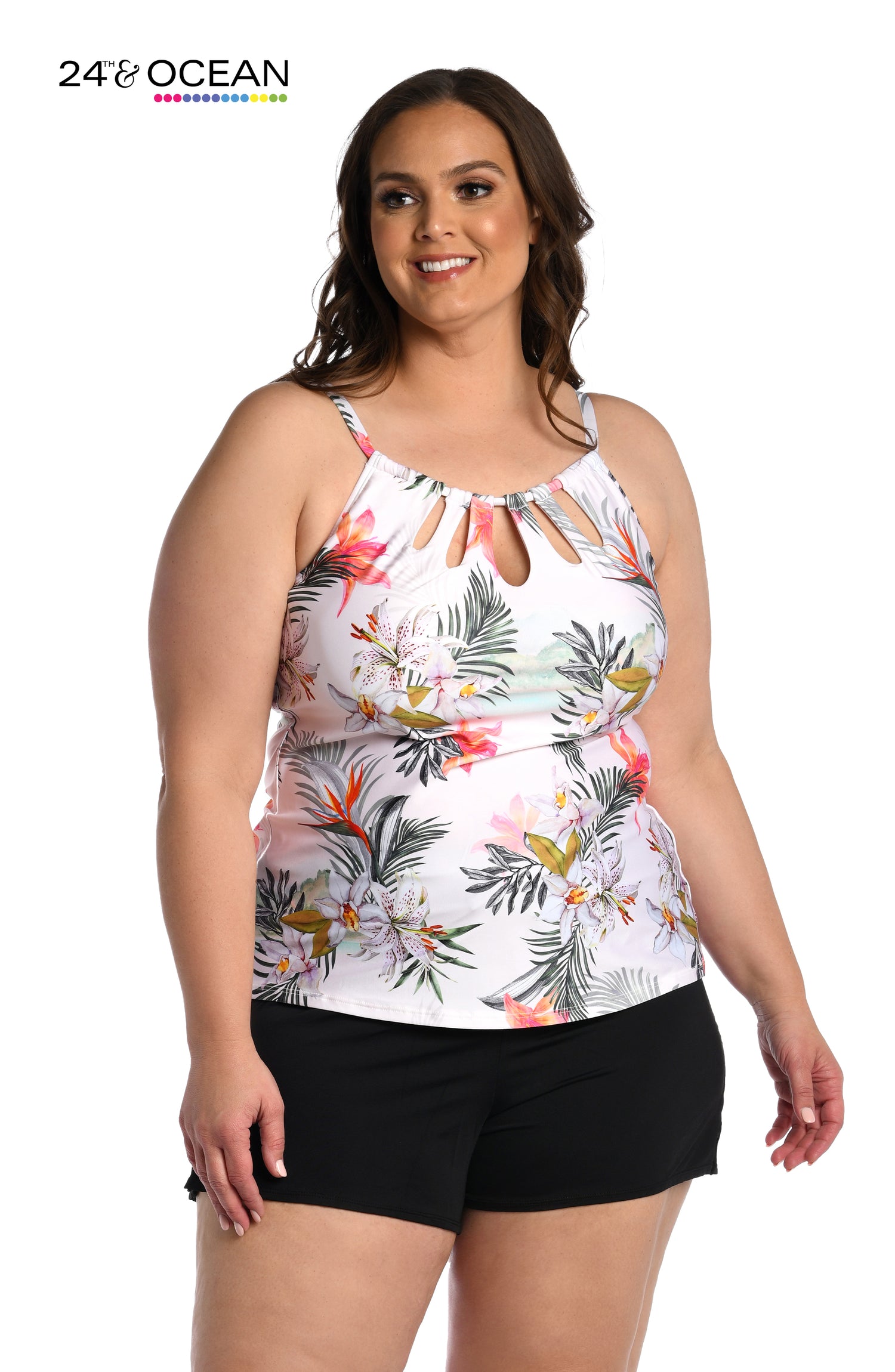 Model is wearing a white multi colored tropical printed high neck tankini top from our Tahiti Skies collection!