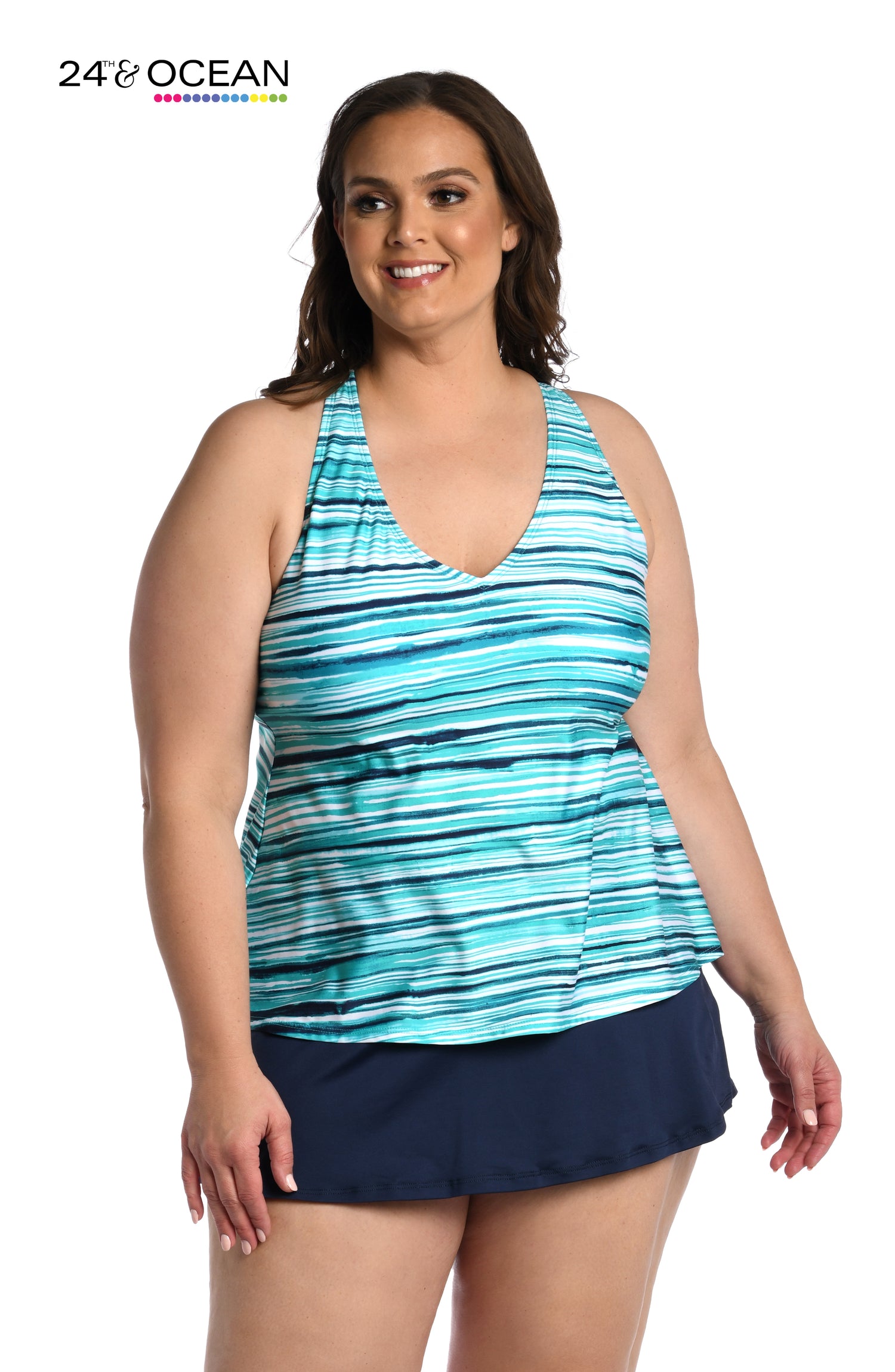 Model is wearing a teal multi colored striped printed over the shoulder tankini top from our Seaside Breeze collection!