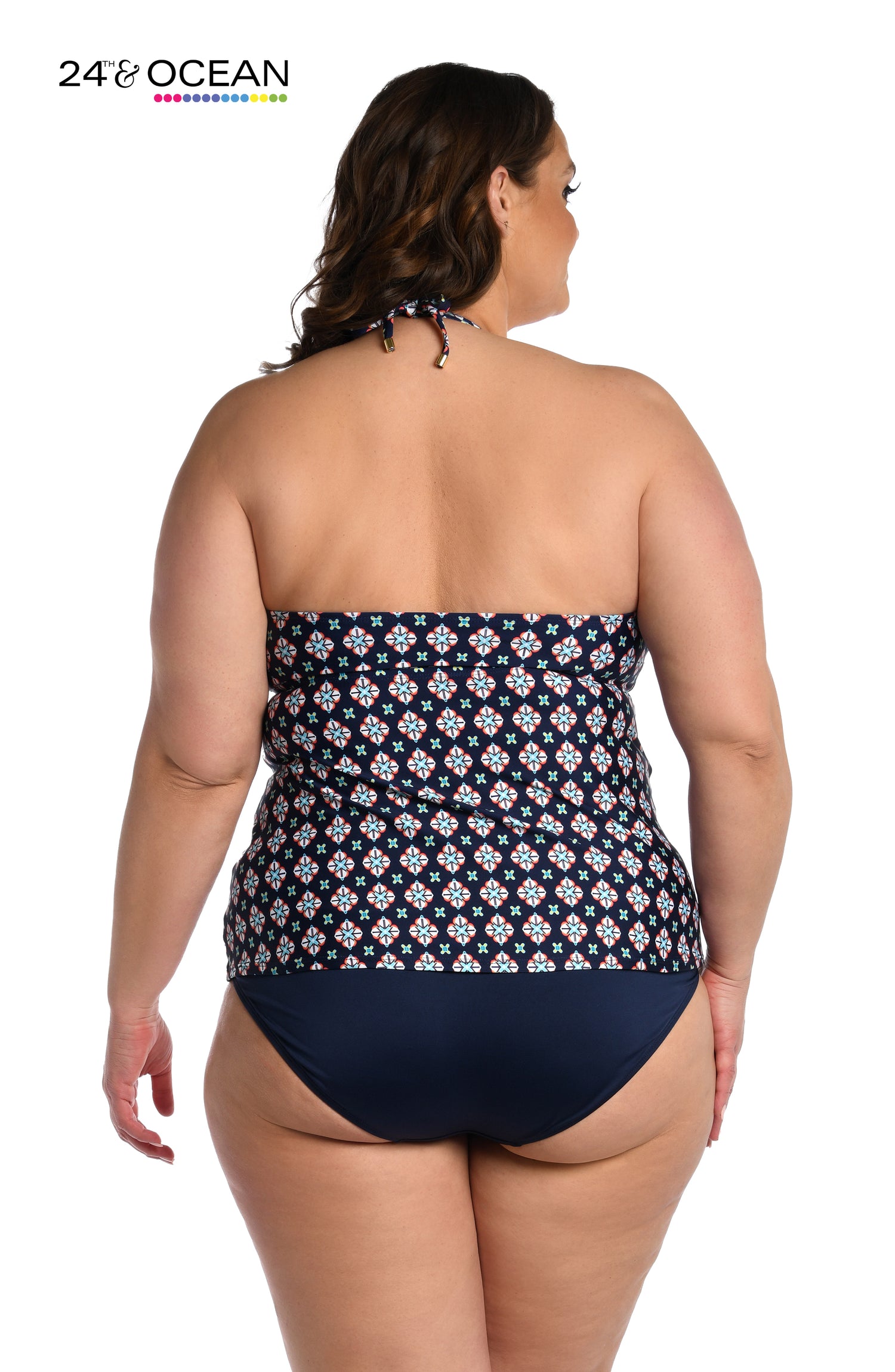 Model is wearing a midnight multi colored geometric printed high neck tankini top from our Alexandria Tile collection!