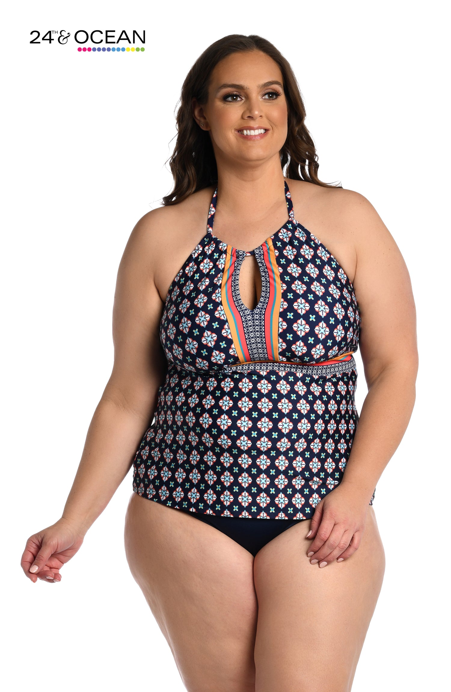 Model is wearing a midnight multi colored geometric printed high neck tankini top from our Alexandria Tile collection!