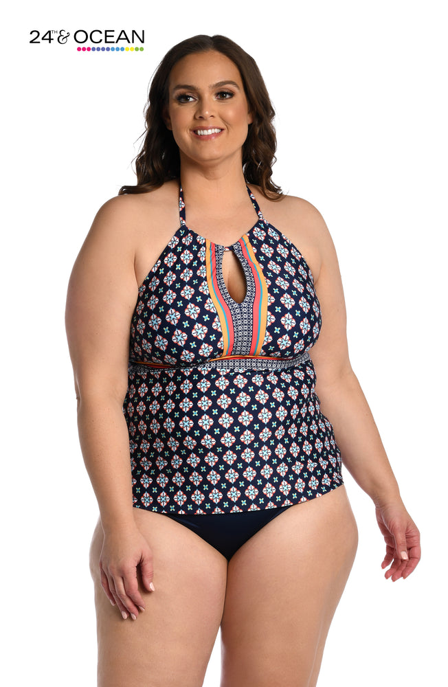 
            
                Load image into Gallery viewer, Model is wearing a midnight multi colored geometric printed high neck tankini top from our Alexandria Tile collection!
            
        