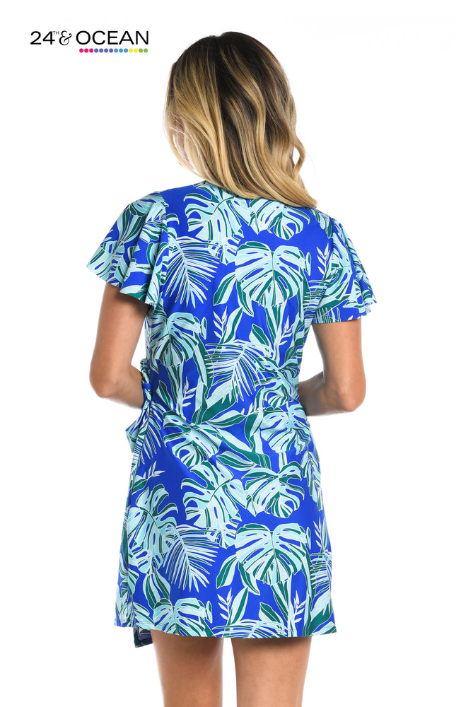 Model is wearing a sapphire multi colored tropical printed cover up dress from our West Palms collection!