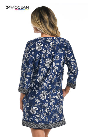 
            
                Load image into Gallery viewer, Model is wearing an indigo multi colored foral printed cover up dress from our Bali Batik collection!
            
        