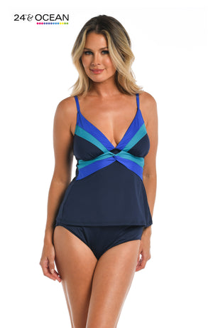 
            
                Load image into Gallery viewer, Model is wearing a vibrant colorblock against a solid black ground printed over the shoulder tankini top from our Colorblock collection!
            
        