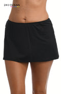Model is wearing a solid black colored skirted hipster bottom from our 24th & Ocean brand.