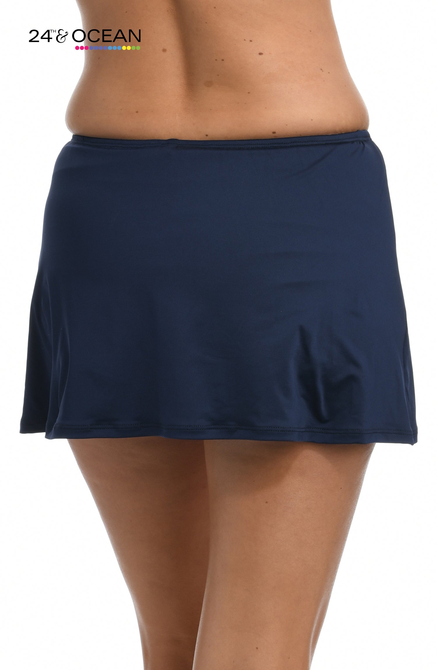Model is wearing a solid midnight blue colored skirted hipster bottom from our 24th & Ocean brand.