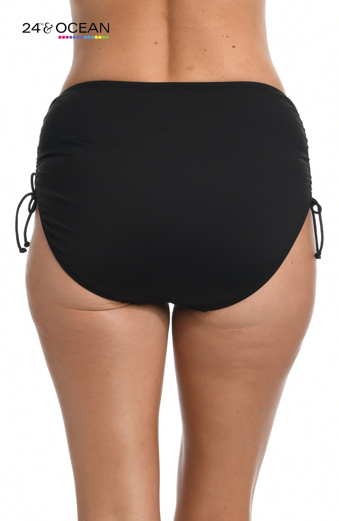 
                  
                    Model is wearing a solid black colored mid waist adjustable hipster bikini bottom from our 24th & Ocean brand.
                  
                