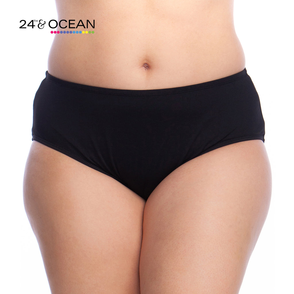 Model is wearing a solid black colored mid waist hipster bikini bottom from our 24th & Ocean brand.