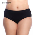 Model is wearing a solid black colored mid waist hipster bikini bottom from our 24th & Ocean brand.