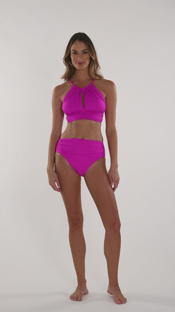 
            
                Load and play video in Gallery viewer, This is a video of a Model is wearing a orchid colored midkini swimsuit top from our Best-Selling Island Goddess collection.
            
        
