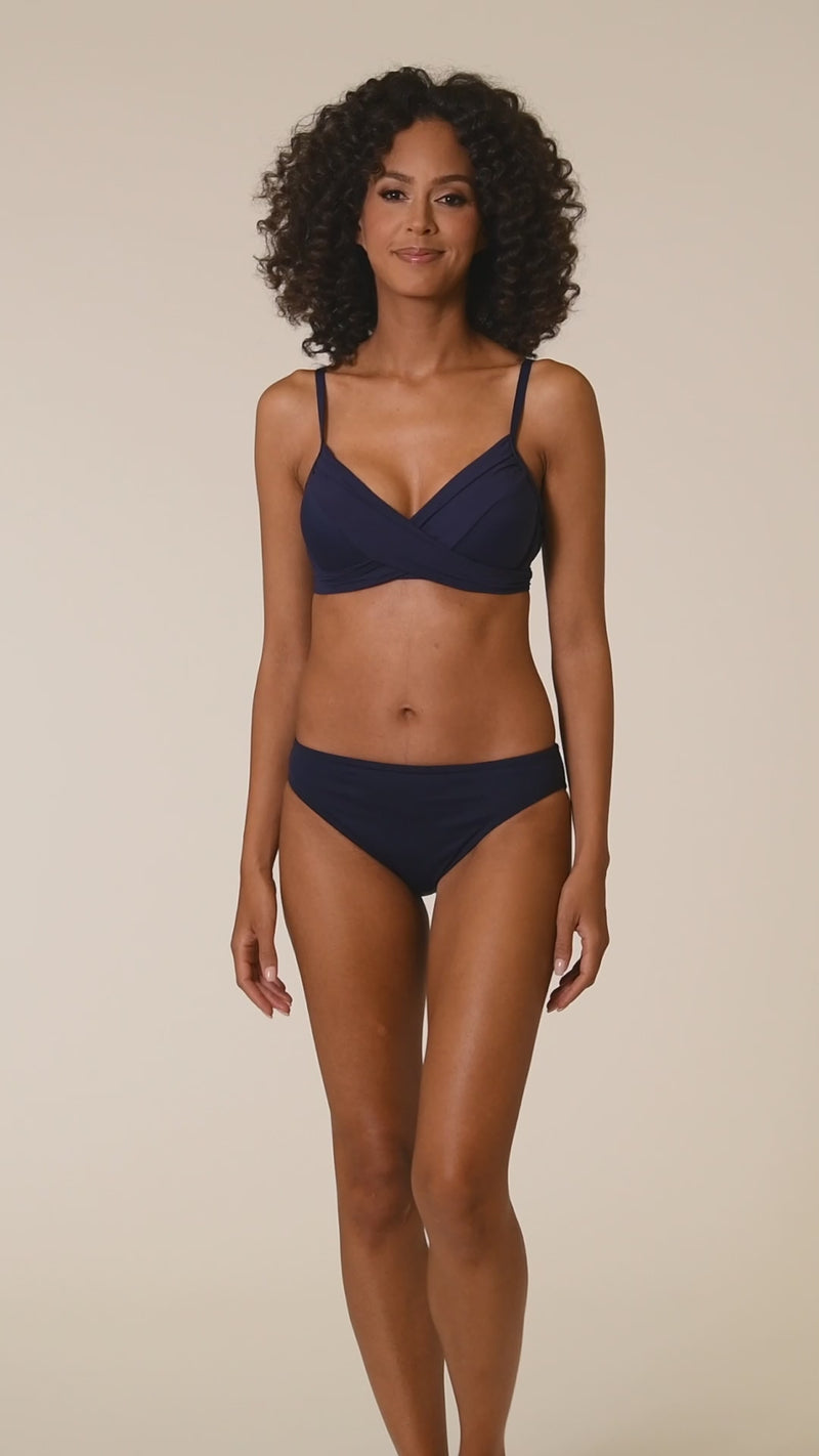 
                  
                    Load and play video in Gallery viewer, This is a video of a Model is wearing a indigo colored underwire swimsuit top from our Best-Selling Island Goddess collection.
                  
                