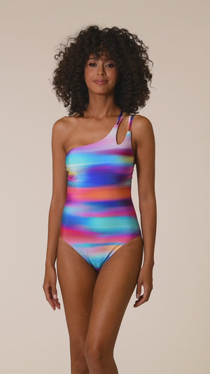 
            
                Load and play video in Gallery viewer, This is a video of a Model is wearing a multi colored ombre printed strappy one shoulder one piece from our Sunset Shores collection!
            
        