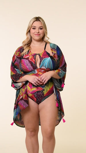 
            
                Load and play video in Gallery viewer, This is a video of a Model is wearing a shiny multicolored tropical printed kimono cover up from our Sunlit Soriee collection!
            
        